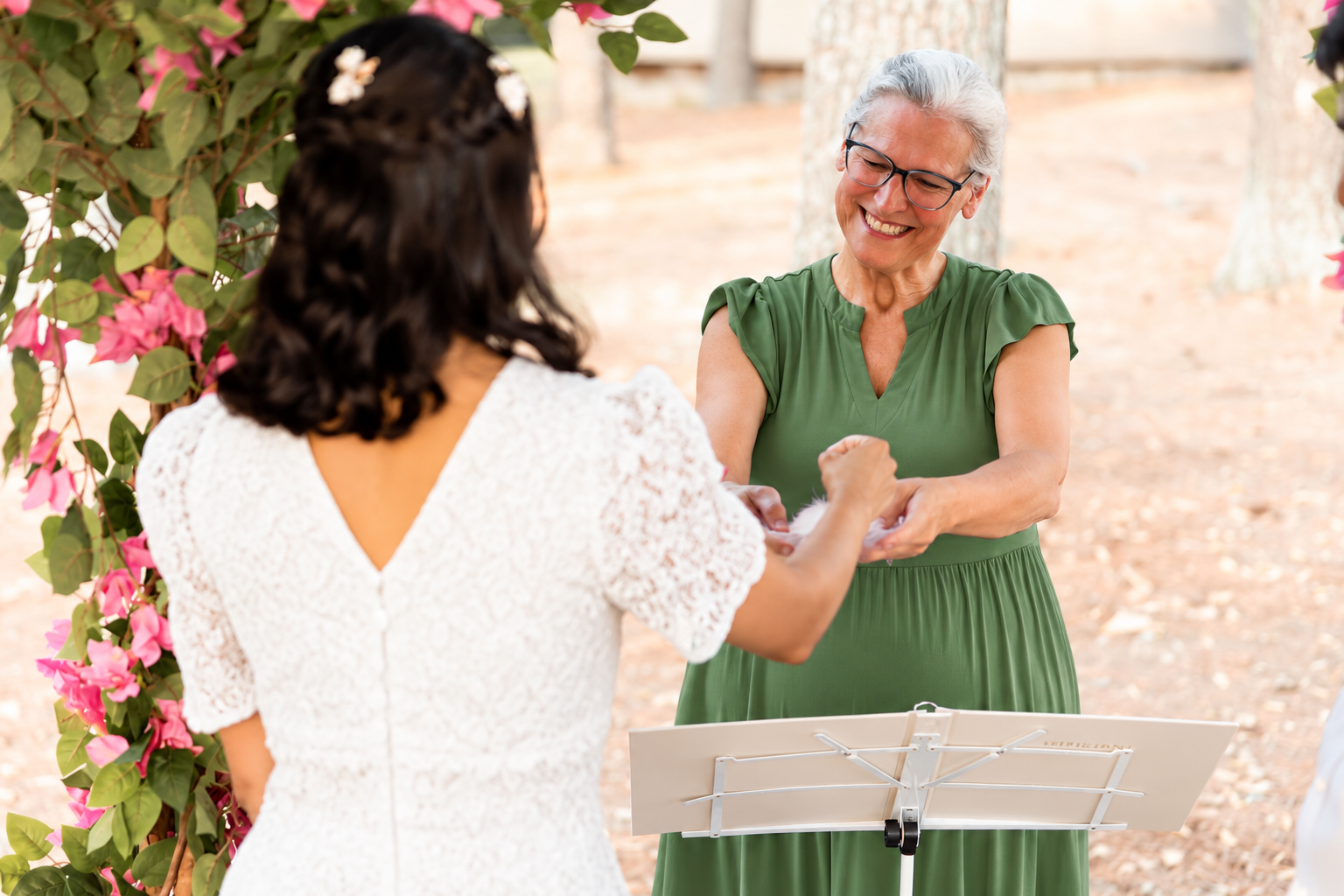 Beth officiating a wedding ceremony